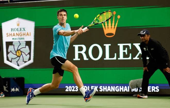 (231012) -- SHANGHAI, Oct. 12, 2023 -- Fabian Marozsan returns the ball during the men s singles quaterfinal between Fabian Marozsan of Hungary and Hubert Hurkacz of Poland at the ATP, Tennis Herren World Tour Shanghai Masters tennis tournament at Qizhong Forest Sports City Arena in Shanghai, east China, Oct. 12, 2023. ) (SP)CHINA-SHANGHAI-TENNIS-ATP TOUR-SHANGHAI MASTERS(CN) WangxLili 