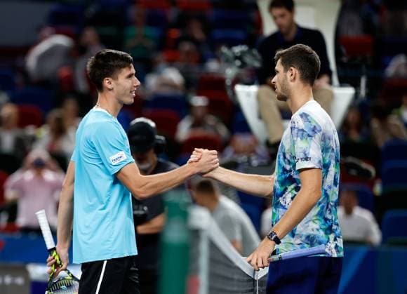 (231012) -- SHANGHAI, Oct. 12, 2023 -- Hubert Hurkacz (R) greets Fabian Marozsan after winning the men s singles quaterfinal between Fabian Marozsan of Hungary and Hubert Hurkacz of Poland at the ATP, Tennis Herren World Tour Shanghai Masters tennis tournament at Qizhong Forest Sports City Arena in Shanghai, east China, Oct. 12, 2023. ) (SP)CHINA-SHANGHAI-TENNIS-ATP TOUR-SHANGHAI MASTERS(CN) WangxLili 