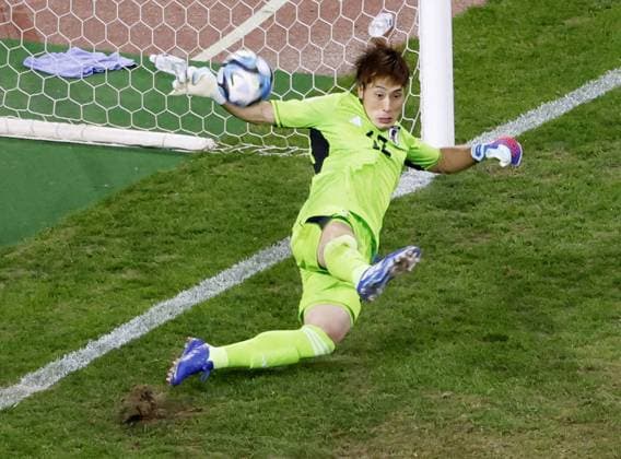 Football: friendly between Japan and Canada Japan goalkeeper Keisuke Osako saves a penalty during the first half of an international football friendly against Canada at Denka Big Swan Stadium in Niigata on Oct. 13, 2023.  A14AA0002013648P