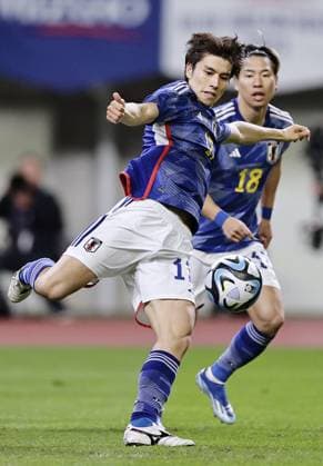 Football: friendly between Japan and Canada Japan s Ao Tanaka (front) scores a goal during the second half of an international football friendly against Canada at Denka Big Swan Stadium in Niigata on Oct. 13, 2023.  A14AA0002013711P