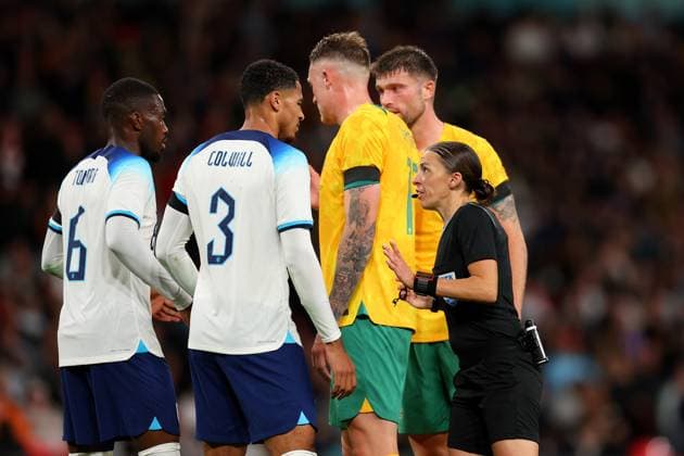 13th October 2023; Wembley Stadium, London, England; International Football Friendly, England versus Australia; Referee Stephanie Frappart speaks to Levi Colwill of England  ActionPlus12564042 ShaunxBrooks