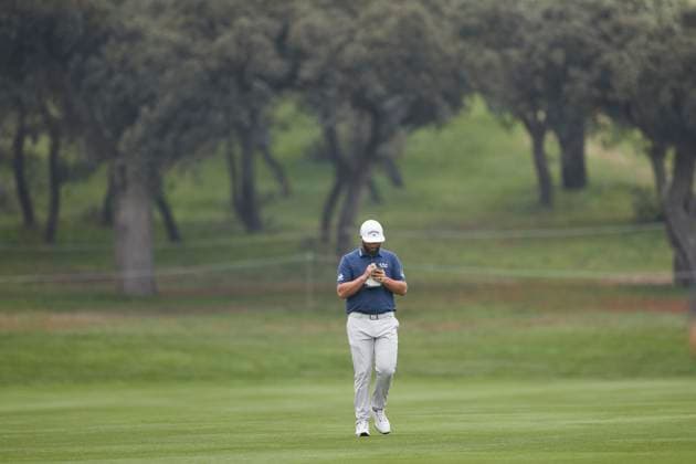 Acciona Open de Espana presented by Madrid - Day Three Jon Rahm of Spain checks his yardage book during Day Three of the Acciona Open de Espana presented by Madrid at Club de Campo Villa de Madrid on October 14, 2023, in Madrid, Spain. Madrid Club de Campo Villa de Madrid Madrid Spain RL_ACCMOESP_420 Copyright: xRicardoxLarreinax