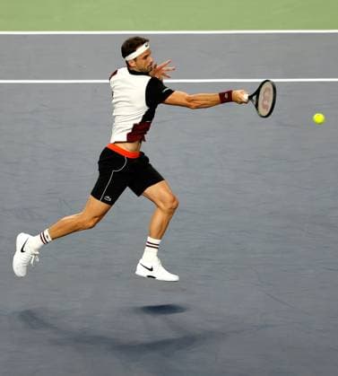 (231015) -- SHANGHAI, Oct. 15, 2023 -- Grigor Dimitrov of Bulgaria returns the ball during the men s singles semifinal between Grigor Dimitrov of Bulgaria and Andrey Rublev of Russia at the ATP, Tennis Herren World Tour Shanghai Masters tennis tournament at Qizhong Forest Sports City Arena in Shanghai, east China, Oct. 14, 2023. ) (SP)CHINA-SHANGHAI-TENNIS-ATP TOUR-SHANGHAI MASTERS(CN) WangxLili 
