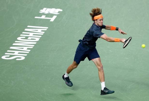 Sport Bilder des Tages (231015) -- SHANGHAI, Oct. 15, 2023 -- Andrey Rublev of Russia returns the ball during the men s singles semifinal between Grigor Dimitrov of Bulgaria and Andrey Rublev of Russia at the ATP, Tennis Herren World Tour Shanghai Masters tennis tournament at Qizhong Forest Sports City Arena in Shanghai, east China, Oct. 14, 2023. ) (SP)CHINA-SHANGHAI-TENNIS-ATP TOUR-SHANGHAI MASTERS(CN) WangxLili 