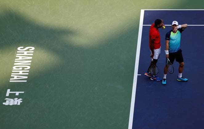 (231015) -- SHANGHAI, Oct. 15, 2023 -- Rohan Bopanna of India Matthew Ebden (R) of Australia react during the men s doubles final between Marcel Granollers of Spain Horacio Zeballos of Argentina and Rohan Bopanna of India Matthew Ebden of Australia at the ATP, Tennis Herren World Tour Shanghai Masters tennis tournament at Qizhong Forest Sports City Arena in Shanghai, east China, Oct. 15, 2023. ) (SP)CHINA-SHANGHAI-TENNIS-ATP TOUR-SHANGHAI MASTERS(CN) WangxLili 