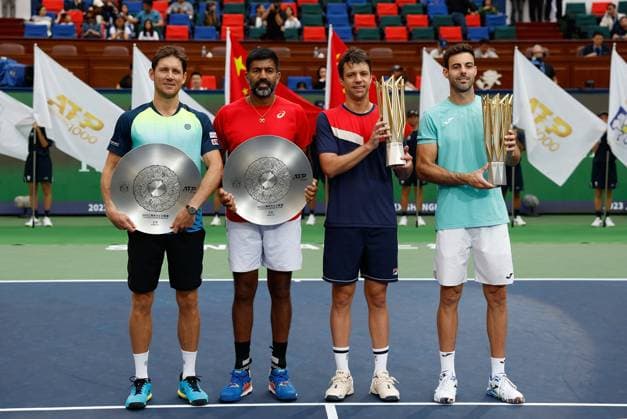 (231015) -- SHANGHAI, Oct. 15, 2023 -- First placed Marcel Granollers (1st R) of Spain Horacio Zeballos (2nd R) of Argentina and second placed Rohan Bopanna (2nd L) of India Matthew Ebden of Australia pose with their trophies during the awarding ceremony of the men s doubles event at the ATP, Tennis Herren World Tour Shanghai Masters tennis tournament at Qizhong Forest Sports City Arena in Shanghai, east China, Oct. 15, 2023. ) (SP)CHINA-SHANGHAI-TENNIS-ATP TOUR-SHANGHAI MASTERS(CN) WangxLili 