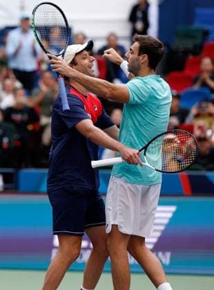 (231015) -- SHANGHAI, Oct. 15, 2023 -- Marcel Granollers (R) of Spain Horacio Zeballos of Argentina celebrate after winning the men s doubles final between Marcel Granollers of Spain Horacio Zeballos of Argentina and Rohan Bopanna of India Matthew Ebden of Australia at the ATP, Tennis Herren World Tour Shanghai Masters tennis tournament at Qizhong Forest Sports City Arena in Shanghai, east China, Oct. 15, 2023. ) (SP)CHINA-SHANGHAI-TENNIS-ATP TOUR-SHANGHAI MASTERS(CN) WangxLili 