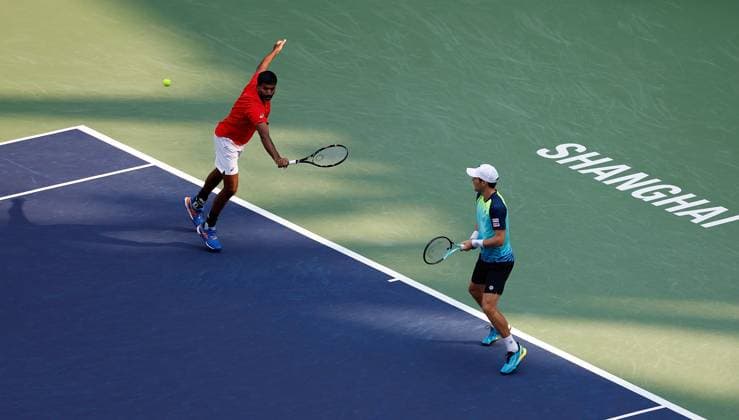 (231015) -- SHANGHAI, Oct. 15, 2023 -- Rohan Bopanna (L) of India Matthew Ebden of Australia compete during the men s doubles final between Marcel Granollers of Spain Horacio Zeballos of Argentina and Rohan Bopanna of India Matthew Ebden of Australia at the ATP, Tennis Herren World Tour Shanghai Masters tennis tournament at Qizhong Forest Sports City Arena in Shanghai, east China, Oct. 15, 2023. ) (SP)CHINA-SHANGHAI-TENNIS-ATP TOUR-SHANGHAI MASTERS(CN) WangxLili 