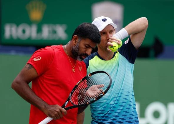 (231015) -- SHANGHAI, Oct. 15, 2023 -- Rohan Bopanna (L) of India Matthew Ebden of Australia react during the men s doubles final between Marcel Granollers of Spain Horacio Zeballos of Argentina and Rohan Bopanna of India Matthew Ebden of Australia at the ATP, Tennis Herren World Tour Shanghai Masters tennis tournament at Qizhong Forest Sports City Arena in Shanghai, east China, Oct. 15, 2023. ) (SP)CHINA-SHANGHAI-TENNIS-ATP TOUR-SHANGHAI MASTERS(CN) WangxLili 