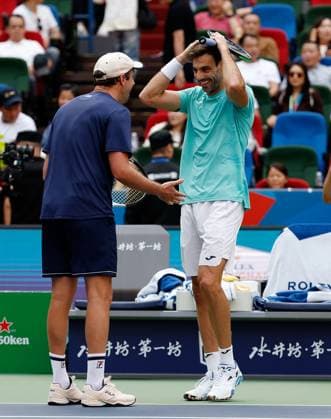 (231015) -- SHANGHAI, Oct. 15, 2023 -- Marcel Granollers (R) of Spain Horacio Zeballos of Argentina celebrate after winning the men s doubles final between Marcel Granollers of Spain Horacio Zeballos of Argentina and Rohan Bopanna of India Matthew Ebden of Australia at the ATP, Tennis Herren World Tour Shanghai Masters tennis tournament at Qizhong Forest Sports City Arena in Shanghai, east China, Oct. 15, 2023. ) (SP)CHINA-SHANGHAI-TENNIS-ATP TOUR-SHANGHAI MASTERS(CN) WangxLili 