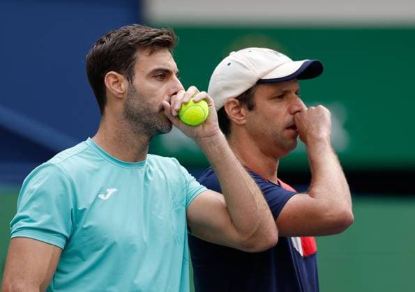 (231015) -- SHANGHAI, Oct. 15, 2023 -- Marcel Granollers (L) of Spain Horacio Zeballos of Argentina react during the men s doubles final between Marcel Granollers of Spain Horacio Zeballos of Argentina and Rohan Bopanna of India Matthew Ebden of Australia at the ATP, Tennis Herren World Tour Shanghai Masters tennis tournament at Qizhong Forest Sports City Arena in Shanghai, east China, Oct. 15, 2023. ) (SP)CHINA-SHANGHAI-TENNIS-ATP TOUR-SHANGHAI MASTERS(CN) WangxLili 