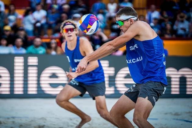 231015 In this handout image from Volleyball World, Swedens Jonatan Hellvig and David Ahman are seen during the semifinal match against Polands Bartosz Losiak and Michal Bryl in the Beach Volleyball World Championships on October 15, 2023 in Tlaxcala, Mexico.  Copyright: VOLLEYBALLxWORLD BB231015BB349