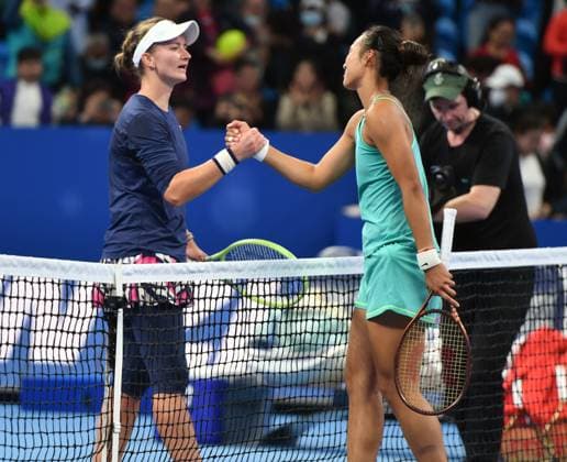 (231015) -- ZHENGZHOU, Oct. 15, 2023 -- Zheng Qinwen (R) greets Barbora Krejcikova after the final match between Zheng Qinwen of China and Barbora Krejcikova of the Czech Republic at the WTA, Tennis Damen World Tour Zhengzhou Open tennis tournament in Zhengzhou, central China s Henan Province, Oct. 15, 2023. ) (SP)CHINA-ZHENGZHOU-TENNIS-WTA TOUR-ZHENGZHOU OPEN(CN) LixJianan 