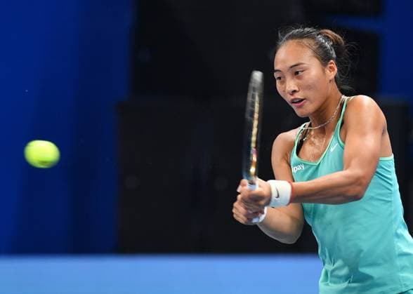 (231015) -- ZHENGZHOU, Oct. 15, 2023 -- Zheng Qinwen returns the ball during the final match between Zheng Qinwen of China and Barbora Krejcikova of the Czech Republic at the WTA, Tennis Damen World Tour Zhengzhou Open tennis tournament in Zhengzhou, central China s Henan Province, Oct. 15, 2023. ) (SP)CHINA-ZHENGZHOU-TENNIS-WTA TOUR-ZHENGZHOU OPEN(CN) LixJianan 