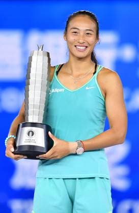 (231015) -- ZHENGZHOU, Oct. 15, 2023 -- Zheng Qinwen poses with the trophy during the awarding ceremony after the final match between Zheng Qinwen of China and Barbora Krejcikova of the Czech Republic at the WTA, Tennis Damen World Tour Zhengzhou Open tennis tournament in Zhengzhou, central China s Henan Province, Oct. 15, 2023. ) (SP)CHINA-ZHENGZHOU-TENNIS-WTA TOUR-ZHENGZHOU OPEN(CN) LixJianan 