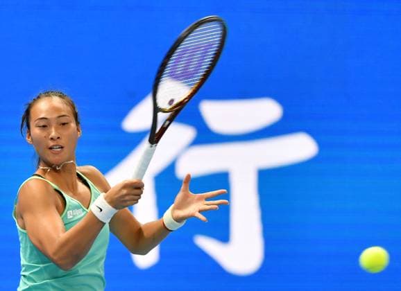 (231015) -- ZHENGZHOU, Oct. 15, 2023 -- Zheng Qinwen returns the ball during the final match between Zheng Qinwen of China and Barbora Krejcikova of the Czech Republic at the WTA, Tennis Damen World Tour Zhengzhou Open tennis tournament in Zhengzhou, central China s Henan Province, Oct. 15, 2023. ) (SP)CHINA-ZHENGZHOU-TENNIS-WTA TOUR-ZHENGZHOU OPEN(CN) LixJianan 