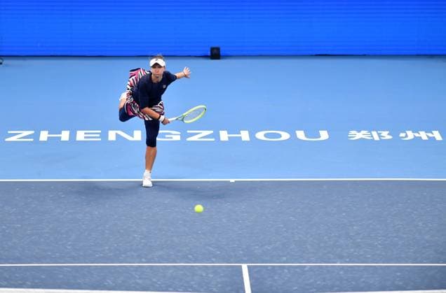 (231015) -- ZHENGZHOU, Oct. 15, 2023 -- Barbora Krejcikova serves the ball during the final match between Zheng Qinwen of China and Barbora Krejcikova of the Czech Republic at the WTA, Tennis Damen World Tour Zhengzhou Open tennis tournament in Zhengzhou, central China s Henan Province, Oct. 15, 2023. ) (SP)CHINA-ZHENGZHOU-TENNIS-WTA TOUR-ZHENGZHOU OPEN(CN) LixJianan 
