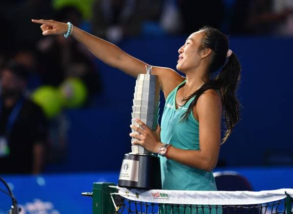 (231015) -- ZHENGZHOU, Oct. 15, 2023 -- Zheng Qinwen celebrates with the trophy after the final match between Zheng Qinwen of China and Barbora Krejcikova of the Czech Republic at the WTA, Tennis Damen World Tour Zhengzhou Open tennis tournament in Zhengzhou, central China s Henan Province, Oct. 15, 2023. ) (SP)CHINA-ZHENGZHOU-TENNIS-WTA TOUR-ZHENGZHOU OPEN(CN) LixJianan 