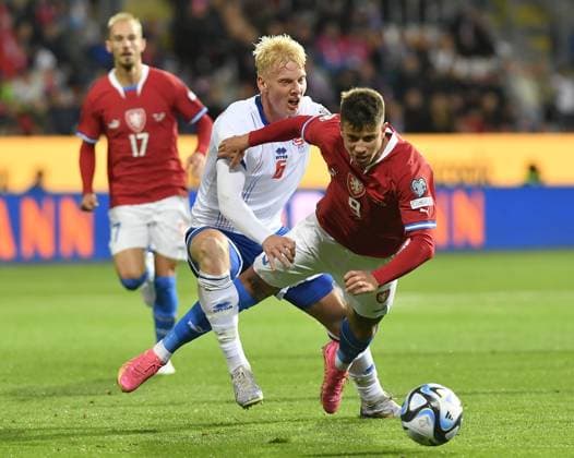 L-R Andrias Edmundsson (FRO) and Adam Hlozek (CZE) in action during the Group E match of the 2024 European Football Championship qualifiers: Czech Republic - Faroe Islands, Pilsen, Czech Republic, on October 15, 2023. (CTKxPhoto MiroslavxChaloupka) CTKPhotoP2023101505417  CTKPhotoP2023101505417