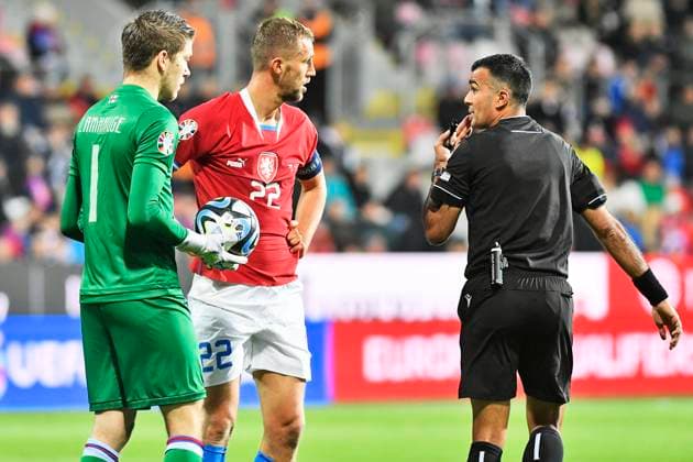 L-R Goalkeeper Mathias Lamhauge (FRO) and Tomas Soucek (CZE) discussing with referee during the Group E match of the 2024 European Football Championship qualifiers: Czech Republic - Faroe Islands, Pilsen, Czech Republic, on October 15, 2023. (CTKxPhoto MiroslavxChaloupka) CTKPhotoP2023101505673  CTKPhotoP2023101505673