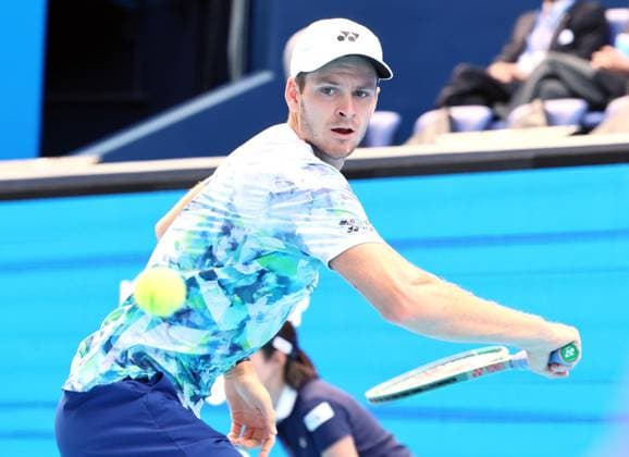 October 18, 2023, Tokyo, Japan - Hubert Hurkacz of Poland returns the ball against Japan s Zhang Zhizhen during the first round match of the Japan Open tennis championships at the Ariake Colosseum in Tokyo on Wednesday, October 18, 2023. (photo by Yoshio Tsunoda AFLO) Noxthirdxpartyxsales  (0309086870st)
