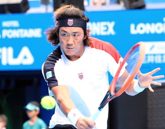 October 18, 2023, Tokyo, Japan - Zhang Zhizhen of China returns the ball against Hubert Hurkacz of Poland during the first round match of the Japan Open tennis championships at the Ariake Colosseum in Tokyo on Wednesday, October 18, 2023. (photo by Yoshio Tsunoda AFLO) Noxthirdxpartyxsales  (0309086920st)