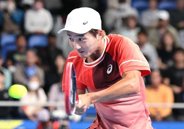 October 19, 2023, Tokyo, Japan - Shintaro Mochizuki of Japan returns the ball against defending champion Taylor Fritz of the United States during the second round match of the Japan Open tennis championships at the Ariake Colosseum in Tokyo on Thursday, October 19, 2023. ( AFLO) Tokyo Japan - ZUMA 0309260102st Copyright: xYoshioxTsunodax