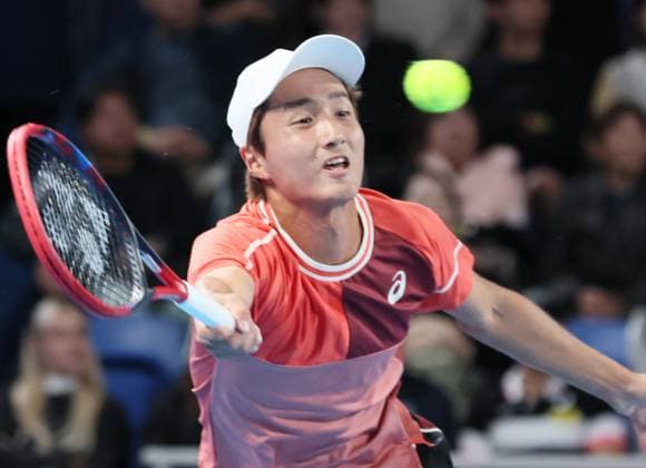 October 19, 2023, Tokyo, Japan - Shintaro Mochizuki of Japan returns the ball against defending champion Taylor Fritz of the United States during the second round match of the Japan Open tennis championships at the Ariake Colosseum in Tokyo on Thursday, October 19, 2023. ( AFLO) Tokyo Japan - ZUMA 0309260107st Copyright: xYoshioxTsunodax