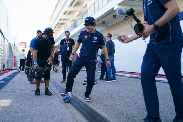 Japanese Formula One driver Yuki Tsunoda of Scuderia AlphaTauri plays hacky sack with a miniature basketball in the paddock prior to the Formula One Grand Prix of the United States at the Circuit of The Americas in Austin, Texas on October 19, 2023.  AUS2023101915 GREGxNASH