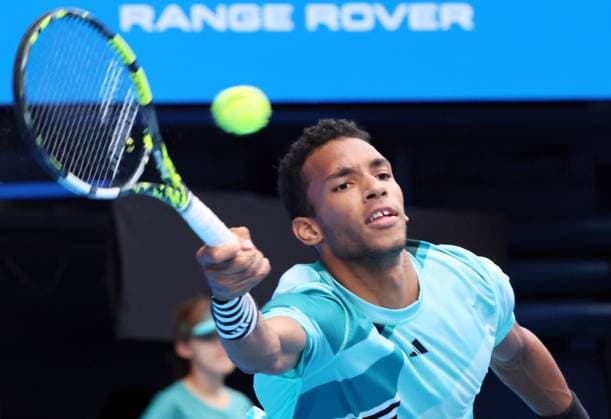 October 20, 2023, Tokyo, Japan - Felix Auger-Aliassime of Canada returns the ball against Marcos Giron of the United States during the quater final match of the Japan Open tennis championships at the Ariake Colosseum in Tokyo on Friday, October 20, 2023. (photo by Yoshio Tsunoda AFLO) Noxthirdxpartyxsales  (233036361)