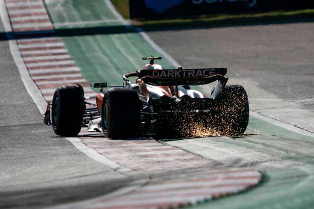 British Formula One driver Lando Norris of McLaren F1 Team takes evasive action to avoid Dutch Formula One driver Max Verstappen of Red Bull Racing in qualifying for the Formula One Grand Prix of the US at the Circuit of The Americas in Austin, Texas, on Friday, October 20, 2023.  AUS20231020907 GREGxNASH