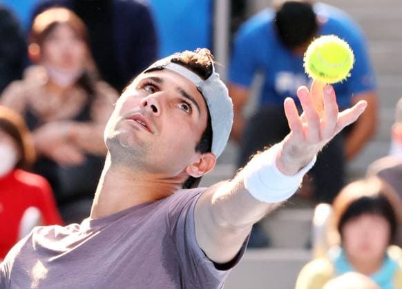 October 21, 2023, Tokyo, Japan - Marcos Giron of the United States tosses the ball to deliver a service against his compatriot Ben Shelton during the semi final match of the Japan Open tennis championships at the Ariake Colosseum in Tokyo on saturiday, October 21, 2023. (photo by Yoshio Tsunoda AFLO) Noxthirdxpartyxsales  (0309543906st)