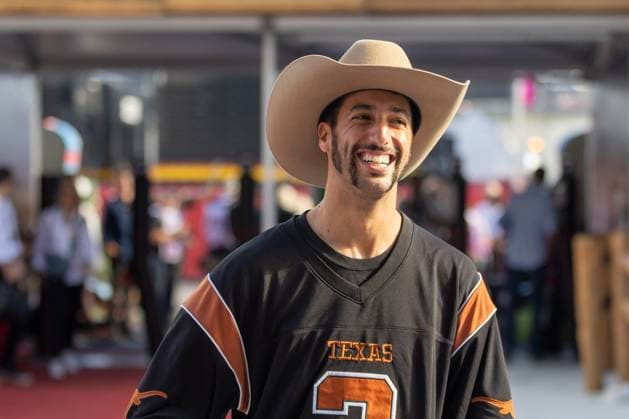 AUSTIN, TX - OCTOBER 22: Scuderia AlphaTauri driver Daniel Ricciardo (3) of Australia smiles at fans as he enters the paddock before the Formula 1 Lenovo United States Grand Prix on October 22, 2023, at Circuit of The Americas in Austin, Texas. (Photo by David Buono Icon Sportswire) AUTO: OCT 22 F1 United States Grand Prix EDITORIAL USE ONLY Icon2310220191