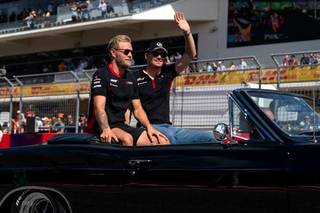 Danish Formula One driver Kevin Magnussen of Haas F1 Team and German Formula One driver Nico Hulkenberg of Haas F1 Team participate in the drivers parade prior to the Formula One Grand Prix of the US at the Circuit of The Americas in Austin, Texas, on Sunday, October 22, 2023.  QUS20231022203 GREGxNASH