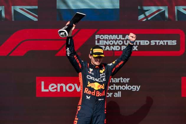 Dutch Formula One driver Max Verstappen of Red Bull Racing holds the first place trophy during the podium ceremony of the Formula One Grand Prix of the US at the Circuit of The Americas in Austin, Texas on Sunday, October 22, 2023.  AUS20231022224 GREGxNASH