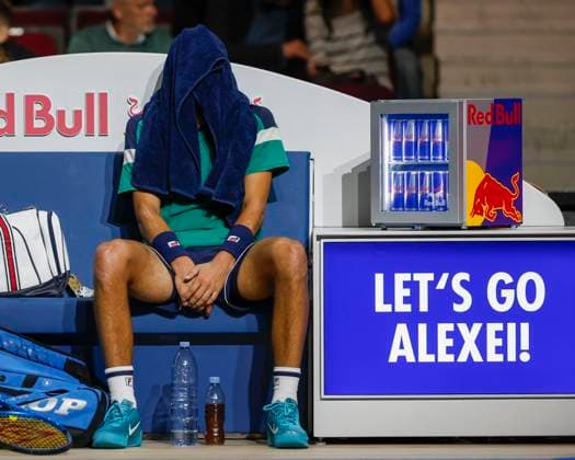 Alexei Popyrin sits on the bench during the break with a towel over his head, concentration,focus,focused Copyright: xJuergenxHasenkopfx