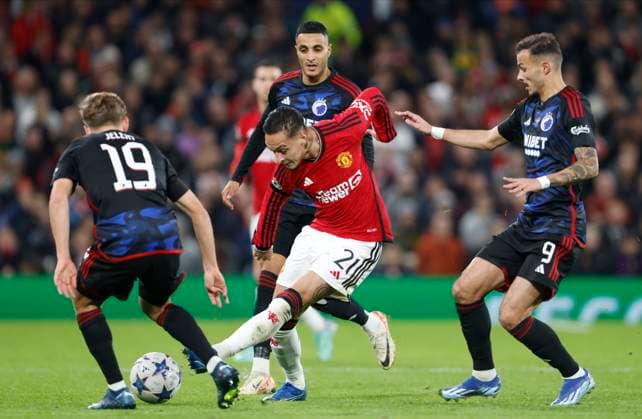 Manchester United, ManU v F.C. Copenhagen: Group A - UEFA Champions League 2023 24 Elias Jelert, Elias Achouri and Diogo Gonçalves of FC Copenhagen in action with Antony of Manchester United during the UEFA Champions League match between Manchester United and F.C. Copenhagen at Old Trafford on October 24, 2023 in Manchester, England. Manchester Old Trafford England United Kingdom Copyright: xRichardxSellers Sportsphoto APLx 13958406
