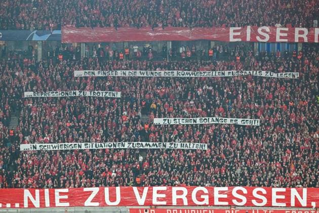 Football, Men, 2023 2024 season, UEFA Champions League Group C, Matchday 3 , 1 FC Union Berlin SSC Napoli, v l The fans of 1 FC Union Berlin with a banner Eisern is ¦ never forget where you come from , 24 10 2023, Copyright: xMatthiasxKochx