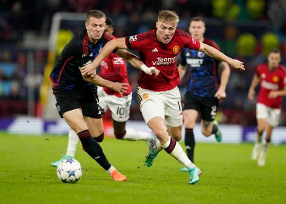 Manchester, England, 24th October 2023. Denis Vavro of FC Copenhagen is turned by Rasmus Hojlund of Manchester United, ManU during the UEFA Champions League match at Old Trafford, Manchester. Picture credit should read: Andrew Yates Sportimage EDITORIAL USE ONLY. No use with unauthorised audio, video, data, fixture lists, club league logos or live services. Online in-match use limited to 120 images, no video emulation. No use in betting, games or single club league player publications. SPI-2672-0063