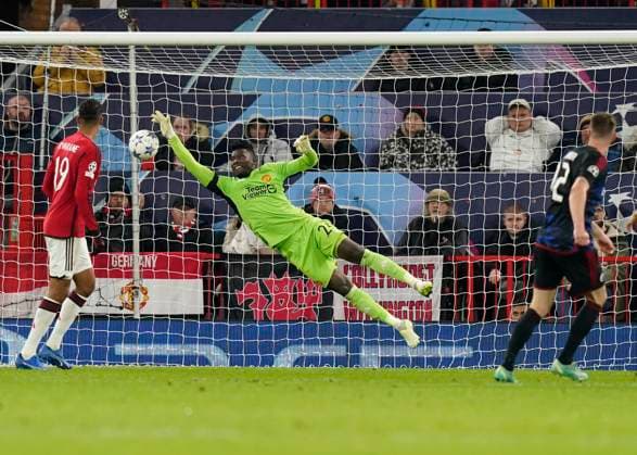 Manchester, England, 24th October 2023. Andrà Onana of Manchester United, ManU produces a save from Lukas Lerager of FC Copenhagen during the UEFA Champions League match at Old Trafford, Manchester. Picture credit should read: Andrew Yates Sportimage EDITORIAL USE ONLY. No use with unauthorised audio, video, data, fixture lists, club league logos or live services. Online in-match use limited to 120 images, no video emulation. No use in betting, games or single club league player publications. SPI-2672-0065