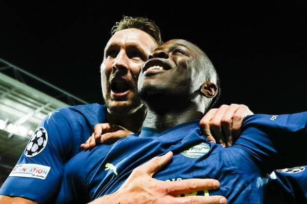 LENS - (l-r) Luuk de Jong of PSV Eindhoven and Johan Bakayoko of PSV Eindhoven celebrate the 0-1 during the UEFA Champions League group B match between RC Lens and PSV Eindhoven at the Stade Bollaert-Delelis on October 24, 2023 in Lens, France. ANP MAURICE VAN STEEN UEFA Champions League 2023 24 2023 2024 xVIxANPxSportx xxANPxIVx 482019586 originalFilename: 482019586.jpg