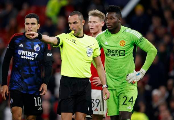 Manchester United, ManU v F.C. Copenhagen: Group A - UEFA Champions League 2023 24 Referee Marco Guida points to the penalty spot during the UEFA Champions League match between Manchester United and F.C. Copenhagen at Old Trafford on October 24, 2023 in Manchester, England. Manchester Old Trafford England United Kingdom Copyright: xRichardxSellers Sportsphoto APLx 13958460