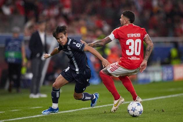 SL Benfica v Real Sociedad: Group D - UEFA Champions League 2023 24 Takefusa Kubo of Real Sociedad competes for the ball with Nicolas Otamendi of SL Benfica during the UEFA Champions League match between SL Benfica and Real Sociedad at Estadio do Lisboa e Benfica on October 24, 2023, in Lisbon, Portugal. Lisbon Estadio do Sport Lisboa e Benfica Lisbon Portugal RL_SLBvRSO_025 Copyright: xRicardoxLarreinax
