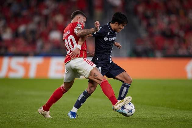 SL Benfica v Real Sociedad: Group D - UEFA Champions League 2023 24 Nicolas Otamendi of SL Benfica competes for the ball with Takefusa Kubo of Real Sociedad during the UEFA Champions League match between SL Benfica and Real Sociedad at Estadio do Lisboa e Benfica on October 24, 2023, in Lisbon, Portugal. Lisbon Estadio do Sport Lisboa e Benfica Lisbon Portugal RL_SLBvRSO_138 Copyright: xRicardoxLarreinax