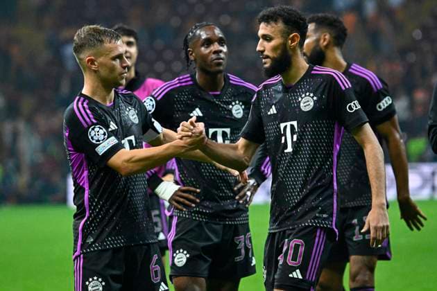 (231025) -- ISTANBUL, Oct. 25, 2023 -- Noussair Mazraoui (R) of FC Bayern Munich and Joshua Kimmich (L) of FC Bayern Munich celebrate their victory against Galatasaray after the UEFA Champions League A group match between Galatasaray and FC Bayern Munich at Rams Park Stadium in Istanbul, T¨¹rkiye, on Oct. 24, 2023. (SP)T?RKIYE-ISTANBUL-FOOTBALL-UEFA CHAMPIONS LEAGUE-GALATASARAY VS FC BAYERN MUNICH WangxFeng 