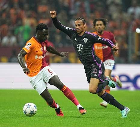 (231025) -- ISTANBUL, Oct. 25, 2023 -- Leroy Sane (R) of FC Bayern Munich vies with Davinson Sanchez Mina of Galatasaray during the UEFA Champions League A group match between Galatasaray and FC Bayern Munich at Rams Park Stadium in Istanbul, T¨¹rkiye, on Oct. 24, 2023. (SP)T?RKIYE-ISTANBUL-FOOTBALL-UEFA CHAMPIONS LEAGUE-GALATASARAY VS FC BAYERN MUNICH WangxFeng 