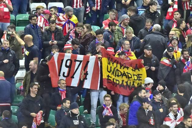 Celtic v Atletico Madrid UEFA Champions League Fans of Atletico Madrid hold up a banner with 1974 inscribed during the UEFA Champions League Group E match at Celtic Park, Glasgow Copyright: xJamiexJohnstonx FIL-19153-0015 UK Newspapers OUT