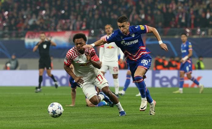 25 10 2023, Football UEFA Champions League 2023 2024, Group G, Matchday 3, RB Leipzig FK Red Star Belgrade, at Red Bull Arena Leipzig L R Lois Openda RB Leipzig vs Stefan Mitrovic Red Star Belgrade DFL and DFB regulations prohibit any use of photographs as image sequences and or quasi video