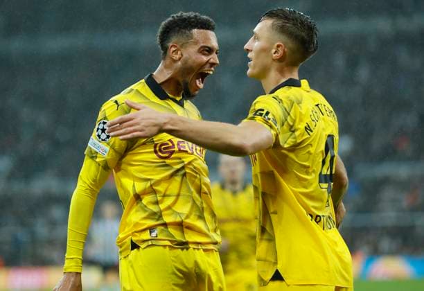 Newcastle United FC v Borussia Dortmund: Group F - UEFA Champions League 2023 24 Felix Nmecha of Borussia Dortmund and Nico Schlotterbeck of Borussia Dortmund celebrates 1st goal during the UEFA Champions League match between Newcastle United FC and Borussia Dortmund at St. James Park on October 25, 2023 in Newcastle Upon Tyne, England. Newcastle St. James Park England United Kingdom Copyright: xRichardxSellers Sportsphoto APLx 13958504