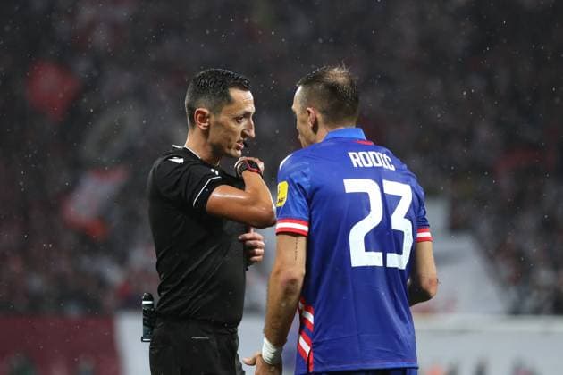 Champions League RB Leipzig vs Red Star Belgrade, 25 10 23 referee Jose Sanchez Martinez Spain in dialogue with Milan Rodic 23, Red Star Belgrade football, UEFA Champions League, season 2023 2024 RB Leipzig vs Red Star Belgrade on 25 10 23 at the Red Bull Arena, Leipzig Copyright: xBEAUTIFULxSPORTS JanxKaeferx